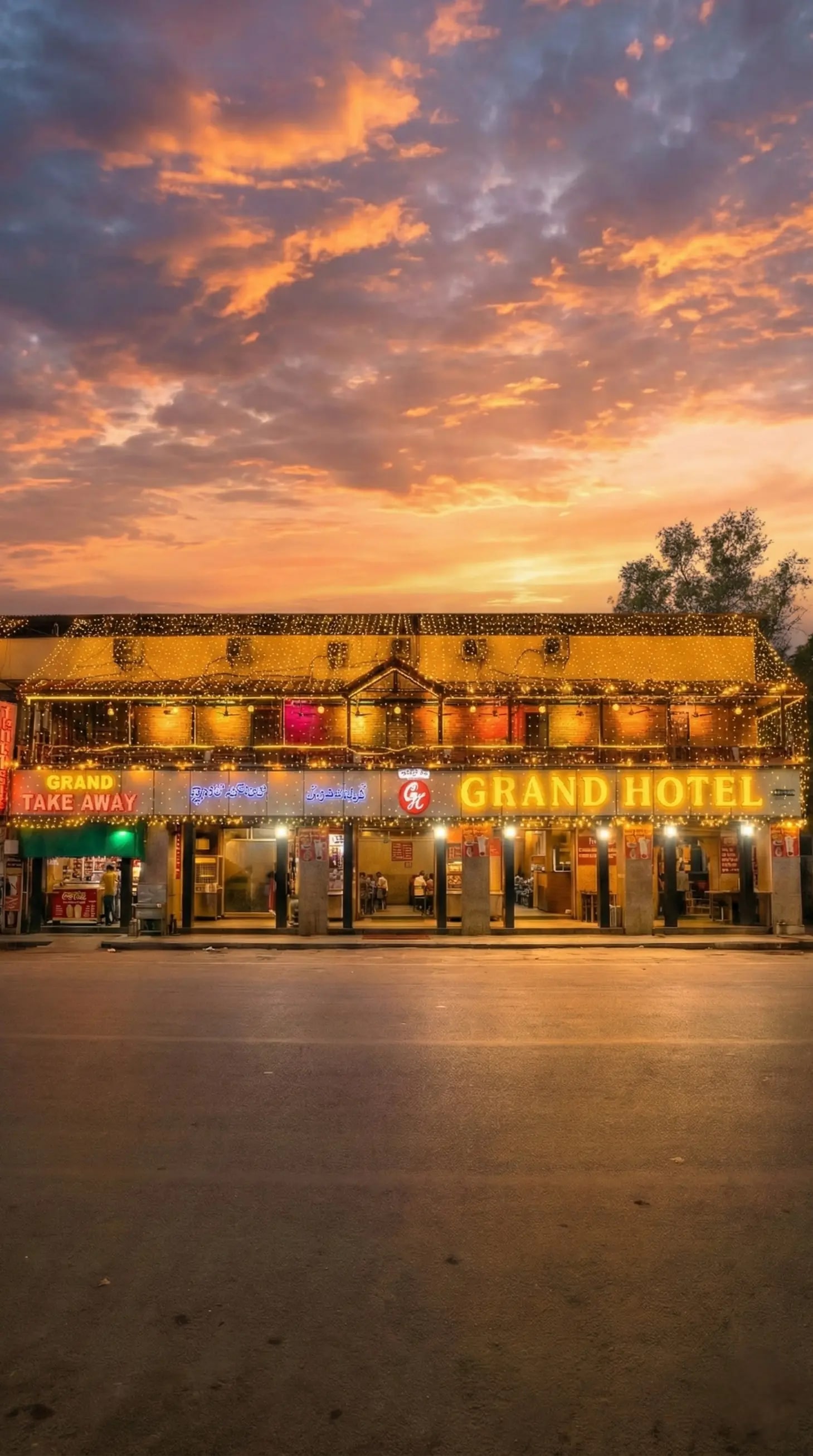 The historic Grand Hotel in Abids today, its frontage lit at dusk