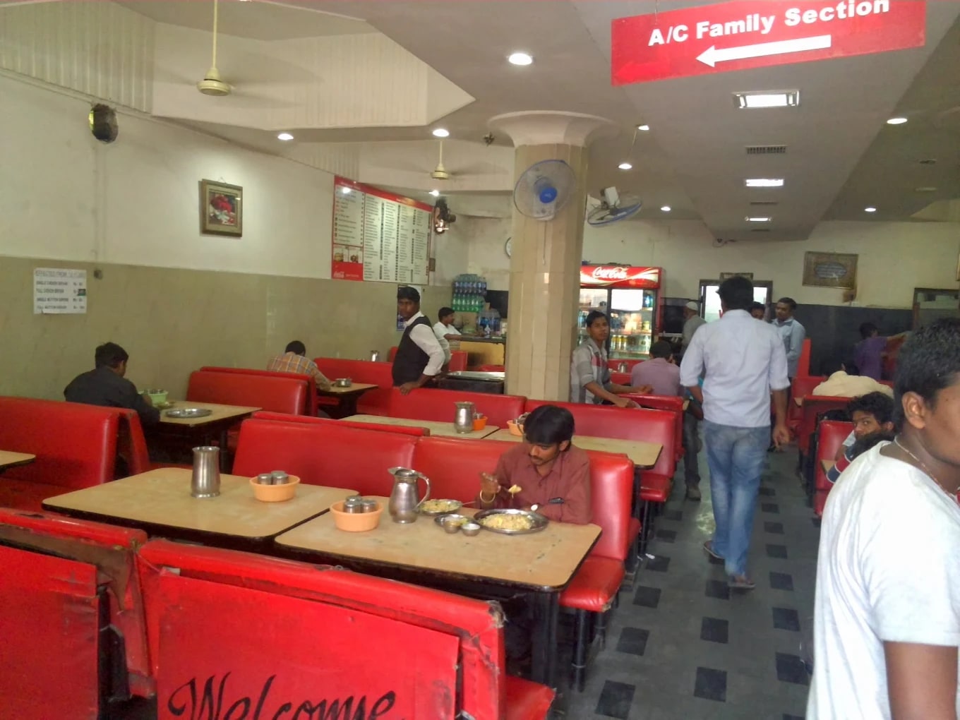 The first Mehfil's dining room in Narayanguda in its early years, with red booths